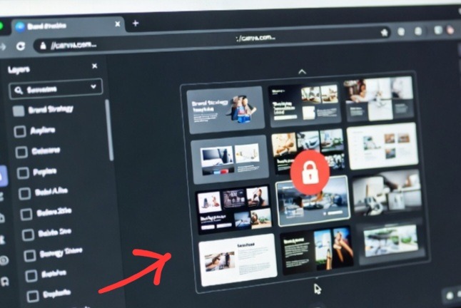 A Google Chrome browser running Canva dark mode with the left Layers panel open, highlighting the individual layer locking option tabs and padlock status symbols